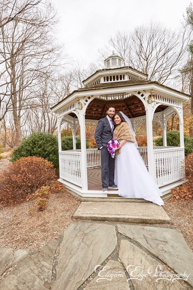 november-wedding-couple-embracing-at-gazebo