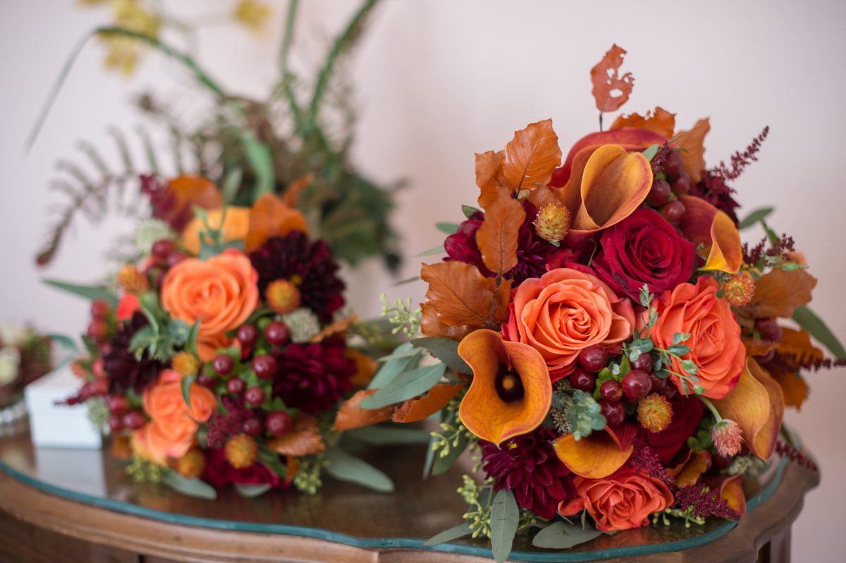 harvest colored roses, grapes cala lillies bouquet