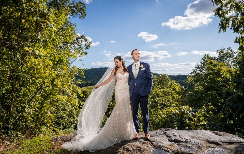 summer-first-look-couple-on-mountain-overlook